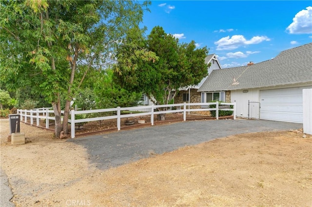 view of yard featuring a garage