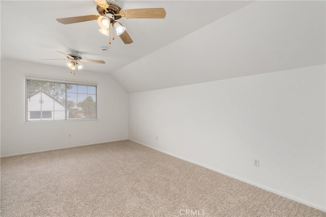 bonus room featuring ceiling fan, carpet, and vaulted ceiling