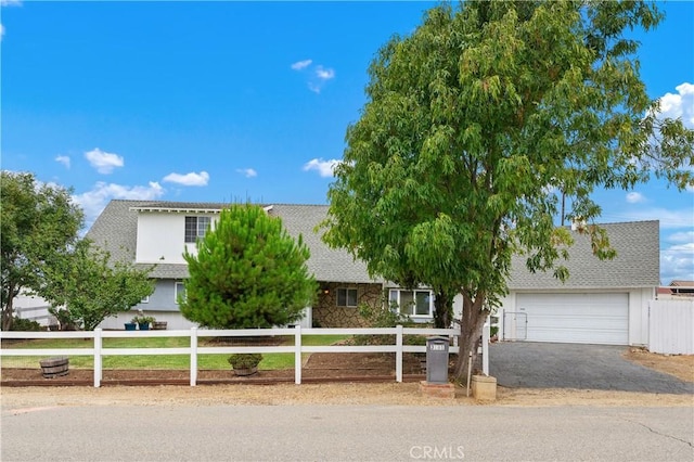 view of front of home featuring a garage