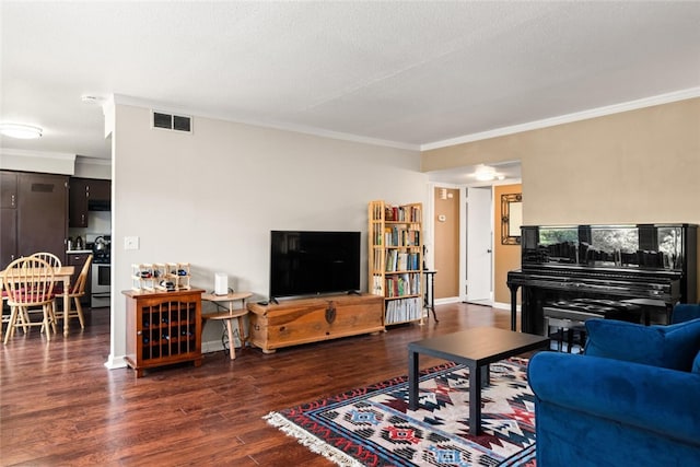 living room featuring a textured ceiling, ornamental molding, and dark hardwood / wood-style floors