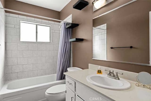 full bathroom with vanity, toilet, and shower / bath combination with curtain