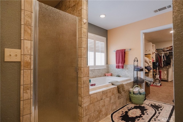 bathroom with independent shower and bath