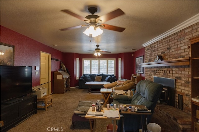 carpeted living room with ceiling fan, a textured ceiling, and a fireplace