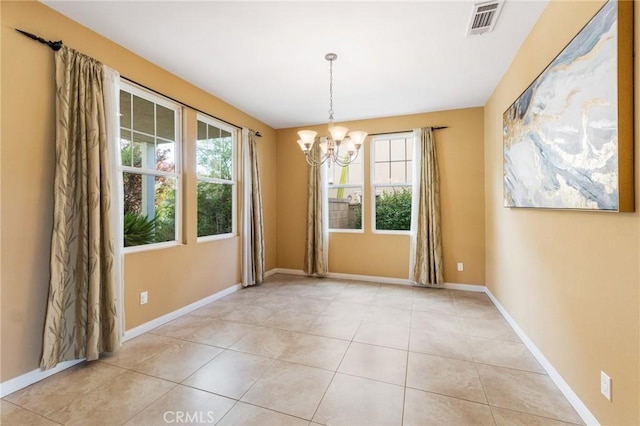 unfurnished dining area with light tile patterned floors and a chandelier