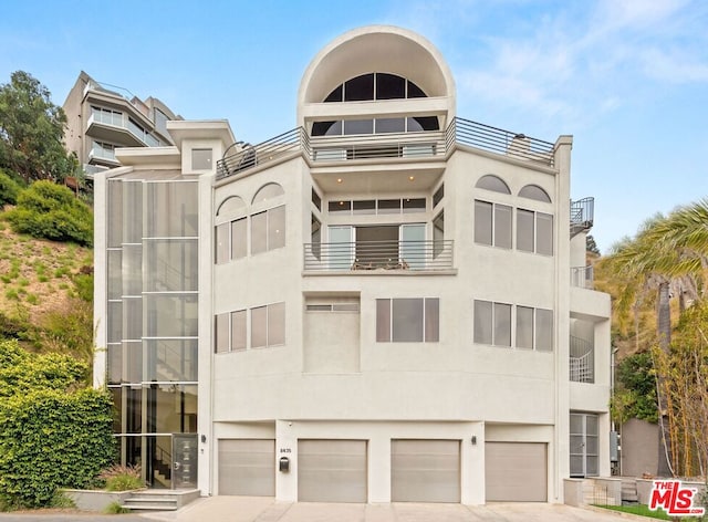 exterior space with a garage