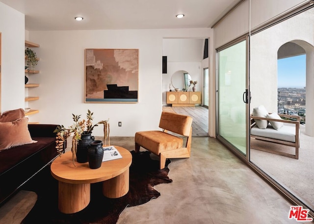 sitting room featuring light hardwood / wood-style flooring