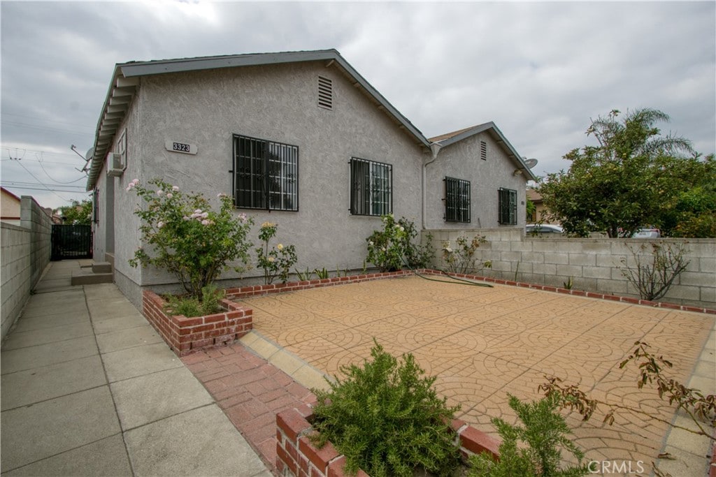 rear view of house with a patio