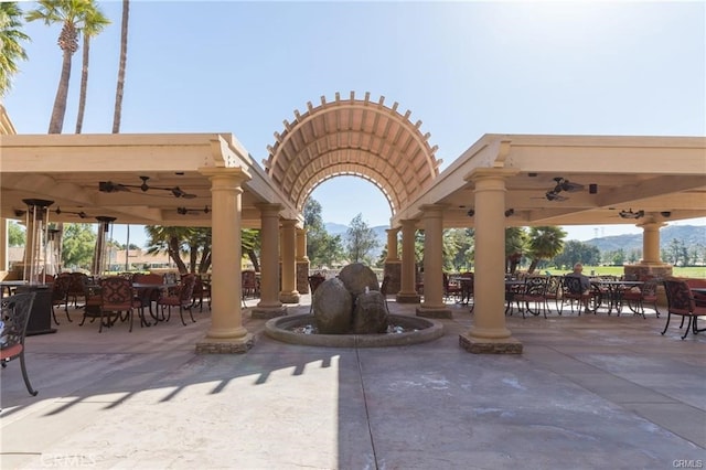 view of property's community with a patio and a gazebo