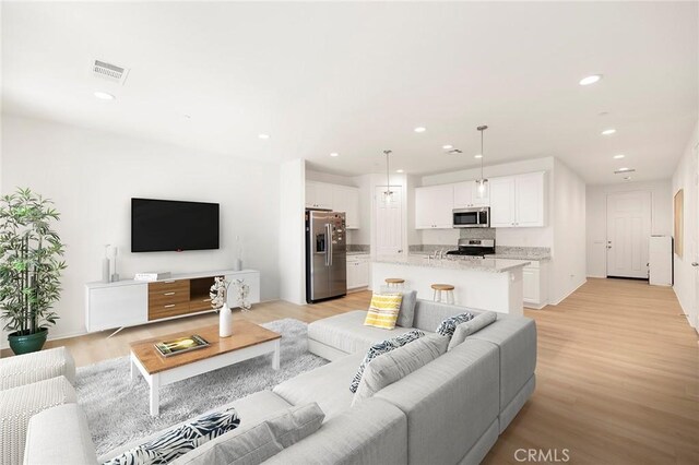 living room featuring light hardwood / wood-style floors