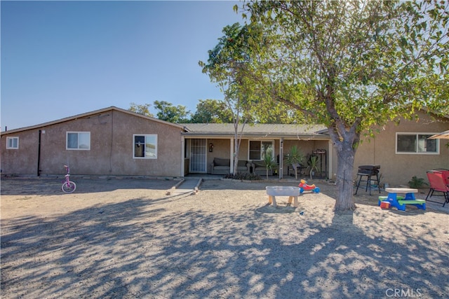 rear view of property with a patio