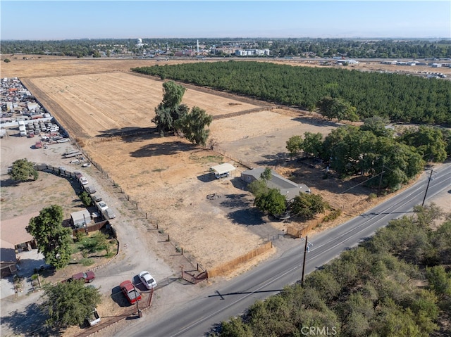 birds eye view of property featuring a rural view