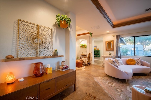 living room with a raised ceiling