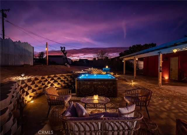 patio terrace at dusk with outdoor lounge area