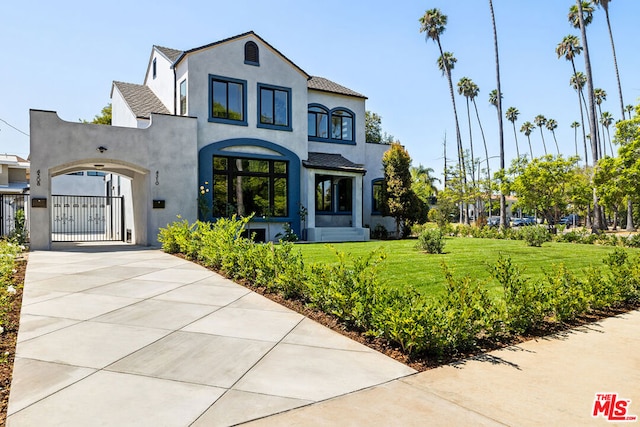 view of front of home with a front yard