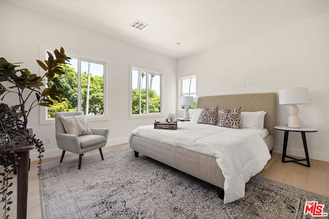 bedroom featuring hardwood / wood-style flooring