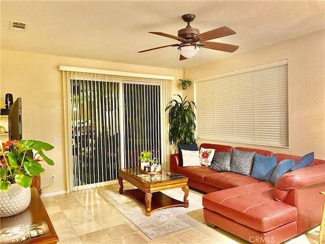 living room featuring ceiling fan