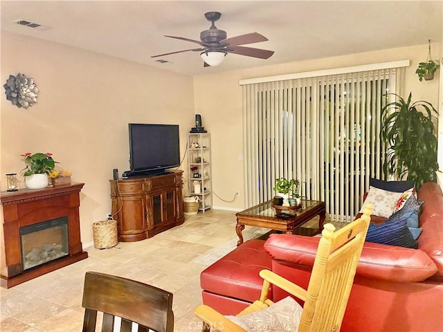 living room with ceiling fan