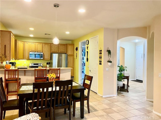 view of tiled dining space