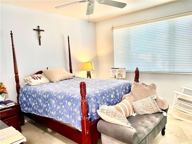 bedroom featuring ceiling fan and carpet floors