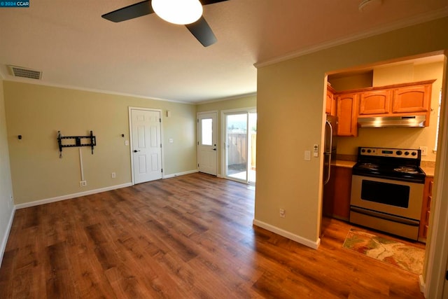 kitchen featuring ornamental molding, ceiling fan, appliances with stainless steel finishes, and dark wood-type flooring