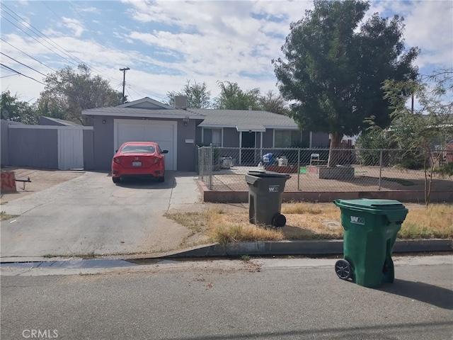 single story home featuring a garage