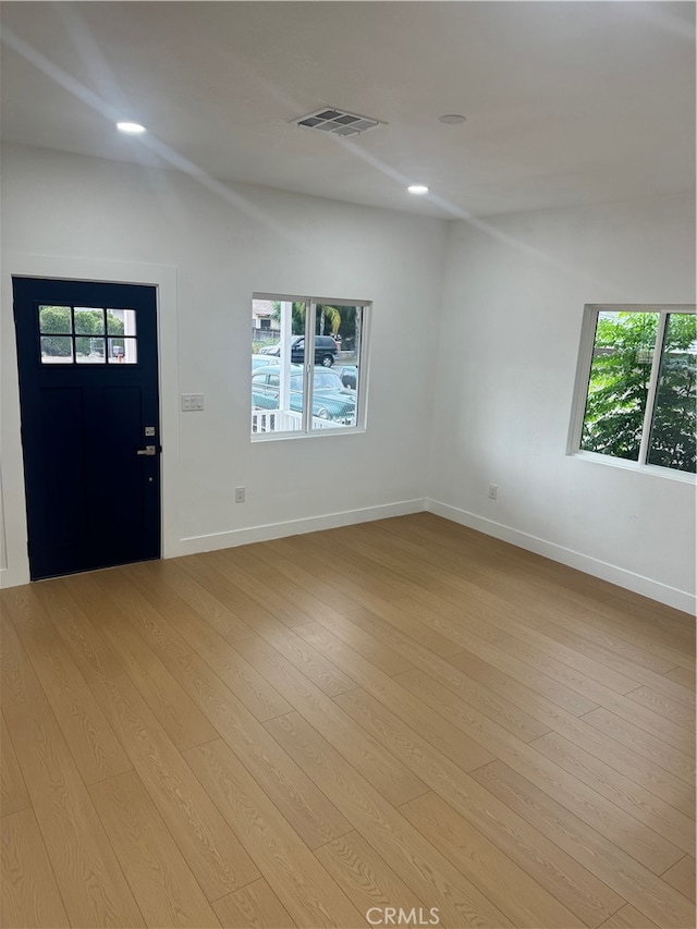 foyer entrance featuring light hardwood / wood-style flooring