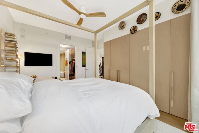 bedroom featuring ceiling fan and light hardwood / wood-style floors