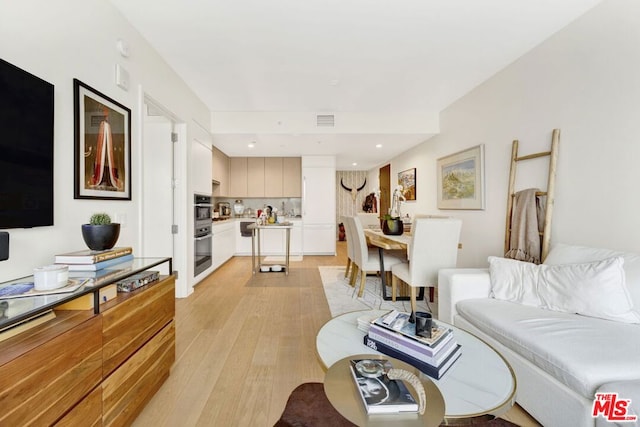 living room featuring light wood-type flooring