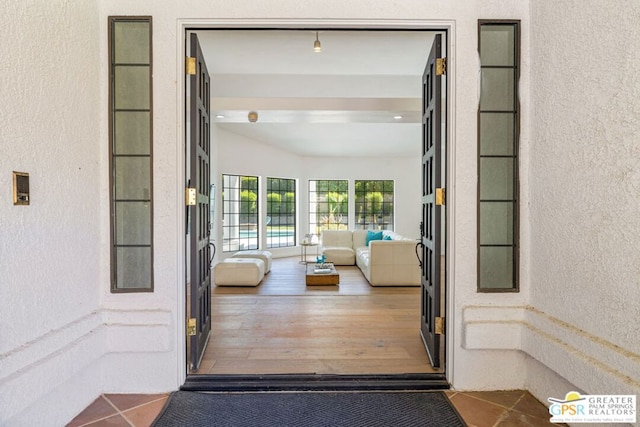 doorway to property featuring an outdoor hangout area