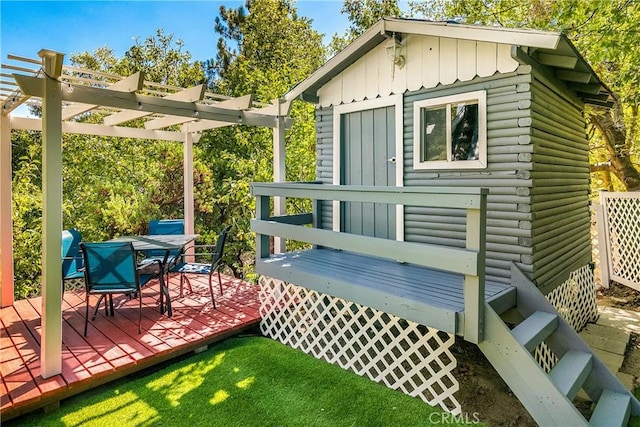28281 Arbon Ln, Lake Arrowhead, CA 92352 - wooden terrace featuring an outdoor structure, outdoor dining area, a pergola, and a yard