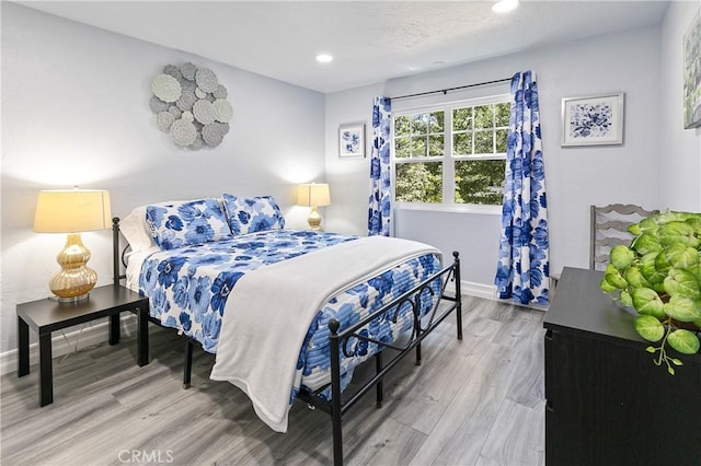 28281 Arbon Ln, Lake Arrowhead, CA 92352 - bedroom with wood finished floors, baseboards, and recessed lighting