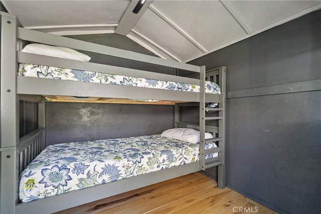 28281 Arbon Ln, Lake Arrowhead, CA 92352 - bedroom featuring wood finished floors and lofted ceiling