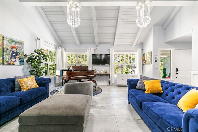 tiled living room featuring a healthy amount of sunlight, beam ceiling, and an inviting chandelier