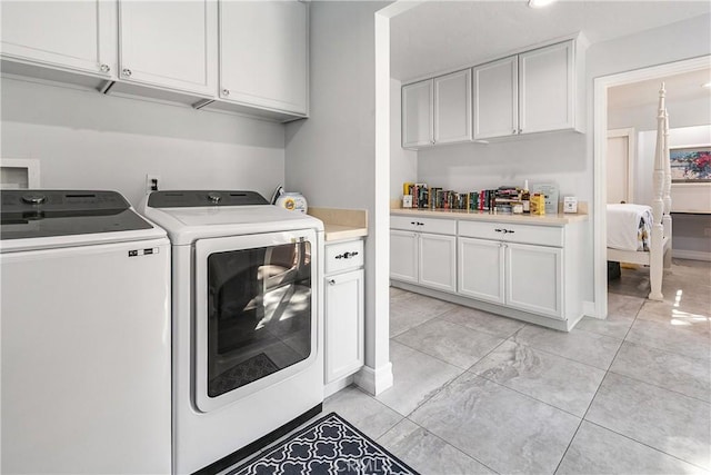 28281 Arbon Ln, Lake Arrowhead, CA 92352 - laundry area with washer and dryer and cabinet space