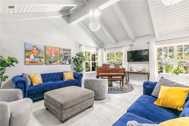 living room with an inviting chandelier, beam ceiling, and high vaulted ceiling