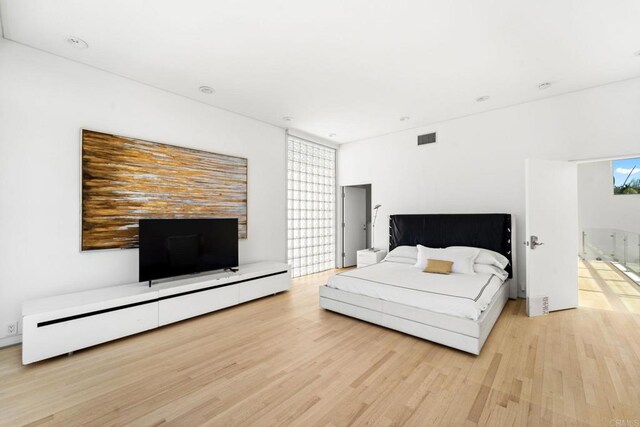 bedroom featuring light hardwood / wood-style flooring