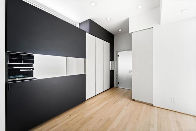 kitchen with light hardwood / wood-style flooring