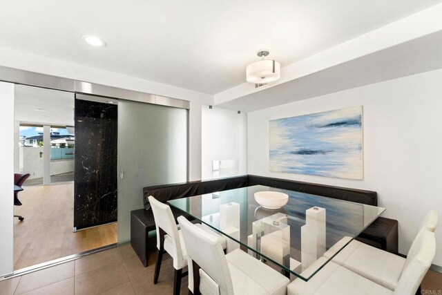 dining area featuring wood-type flooring