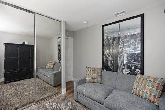 living room with hardwood / wood-style flooring