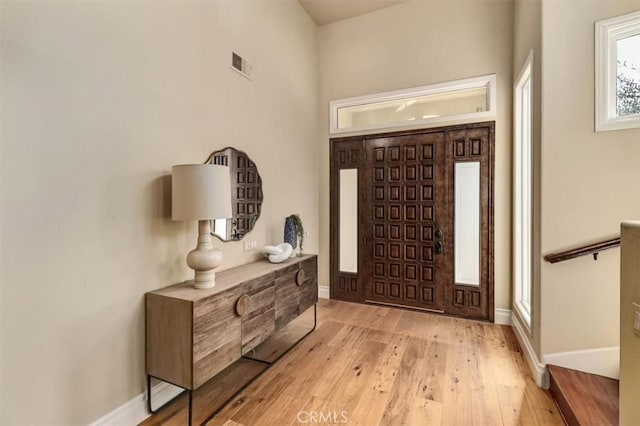 entrance foyer with light hardwood / wood-style floors