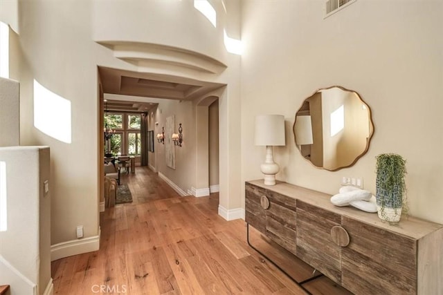 hallway with light wood-type flooring