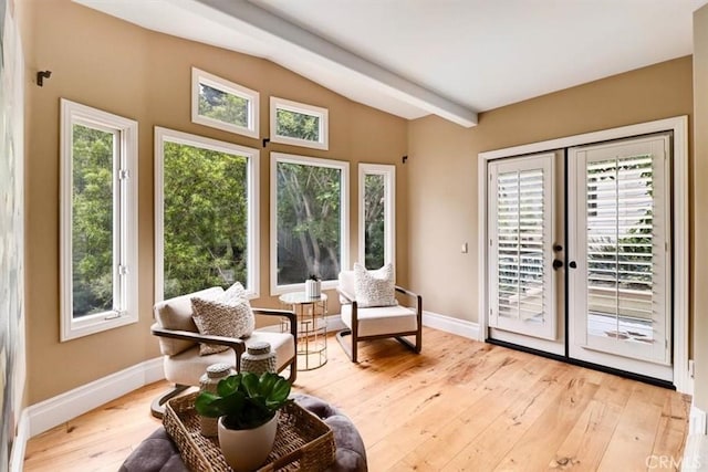 sunroom / solarium with plenty of natural light and french doors