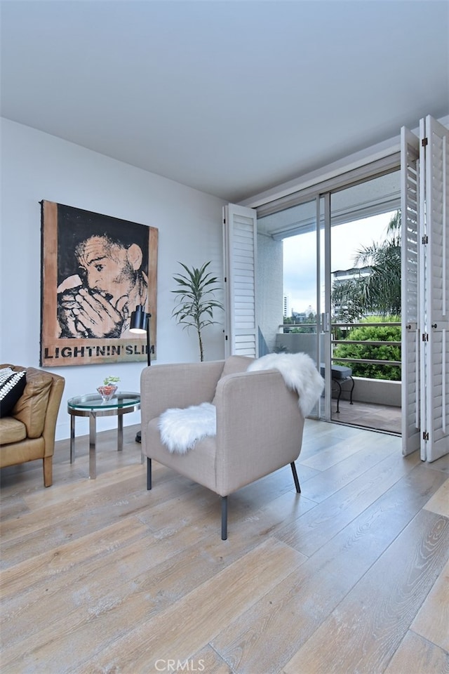 living room with light hardwood / wood-style floors