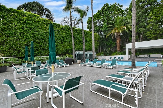 view of patio with a community pool