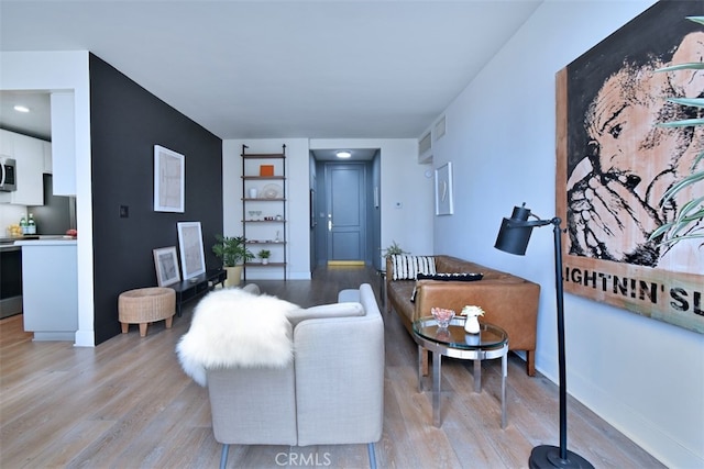 living room featuring light wood-type flooring