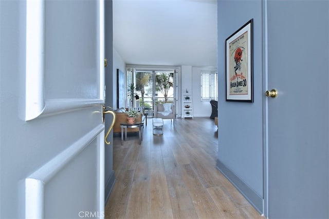 hallway featuring light wood-type flooring