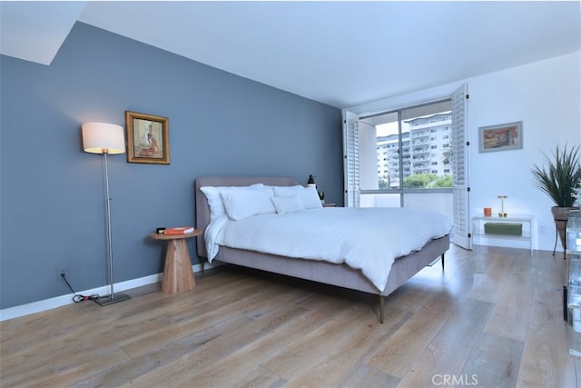 bedroom featuring light wood-type flooring