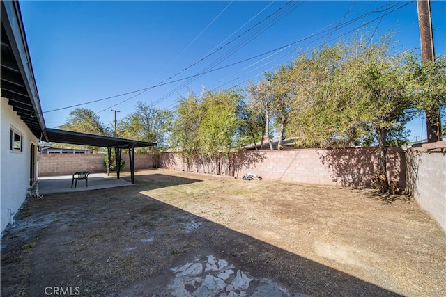 view of yard with a patio area