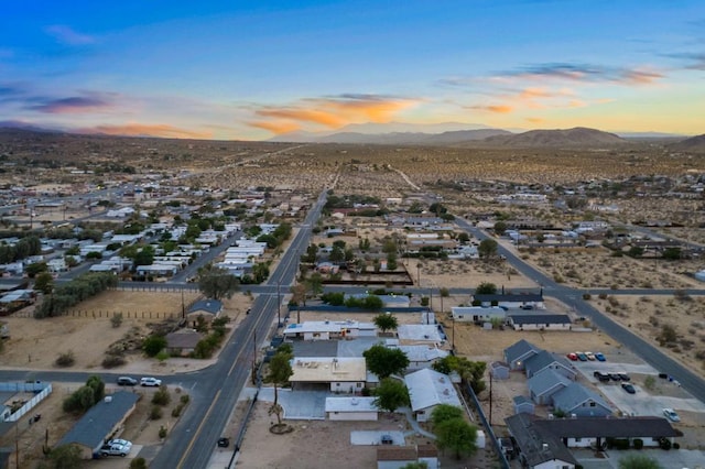 aerial view at dusk with a mountain view