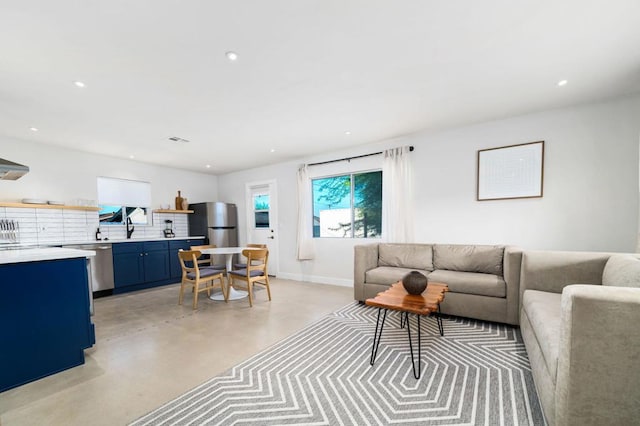 living room featuring sink